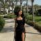 Black ruffles slit dress